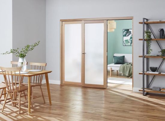 Access door open - Finesse Oak 2.4m (approx 8ft) Internal Bifold Doors - with bottom track