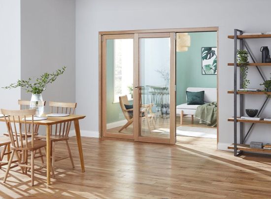 Access door open - Finesse Oak 2.7m (approx 9ft) Internal Bifold Doors - trackless