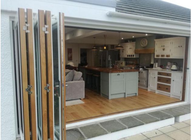 Ultra 4.8M Bifold doors leads onto the garden from the kitchen