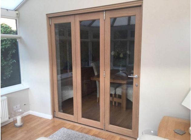 Closed view from the conservatory - Finesse 1.8M Internal bifold doors