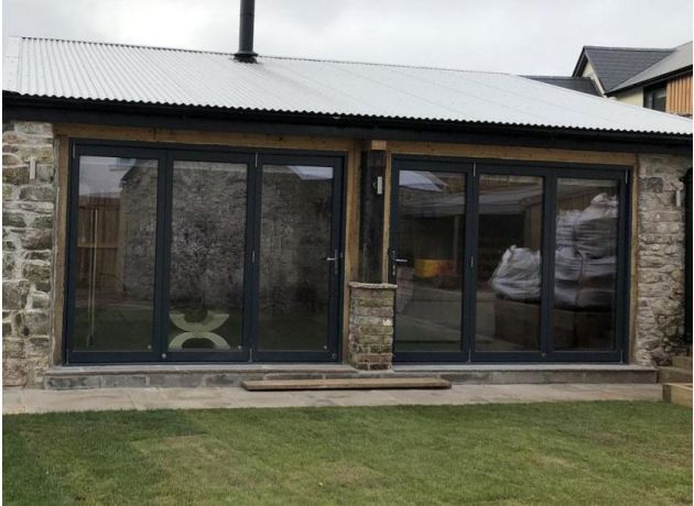 Outside Fully Closed Master 2.7M Grey Timber Bifold Doors