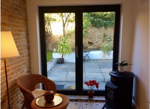 Status 1.8M French Aluminium doors add light into a side extension