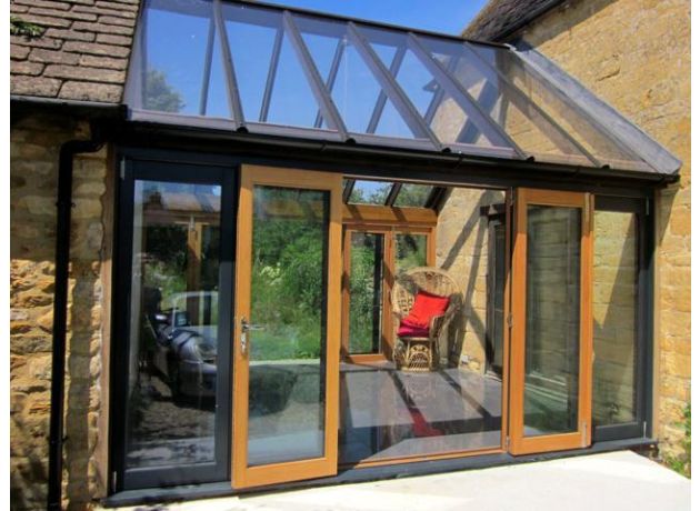 Outside, central opening Ultra 14ft Aluminium Clad External Bi-folding Door