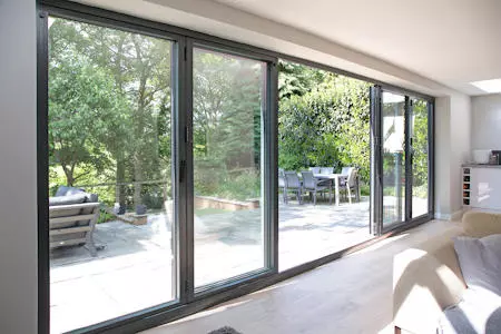 Large part open bifold doors inside view