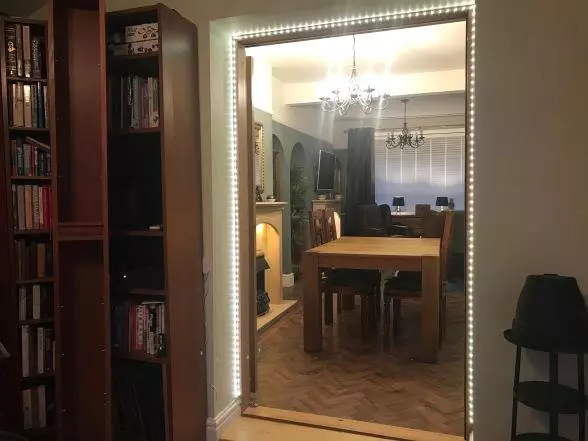 Modern Internal bifold doors - fully open, with LED strip light surround