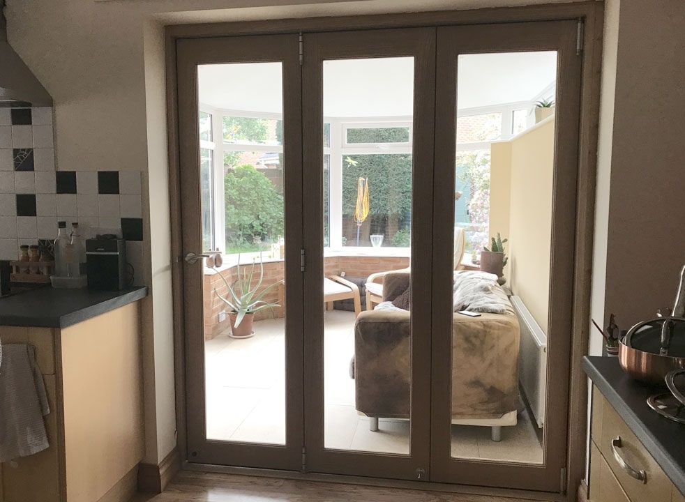 Closed Finesse 1.8M Internal bifold doors looking into the conservatory