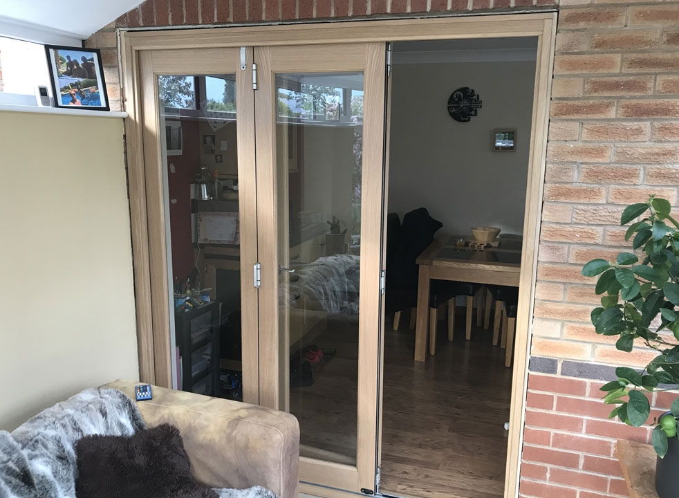 Access door open on a set of Finesse 1.8M Internal bifold doors