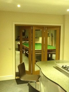 Finesse 1.8M Internal Bifold Door connects pool room