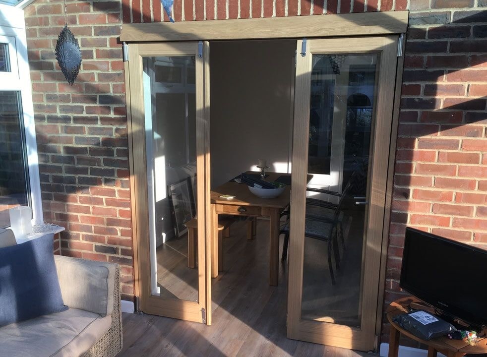 Centre open from the conservatories - Inspire 1.8M internal bifold doors