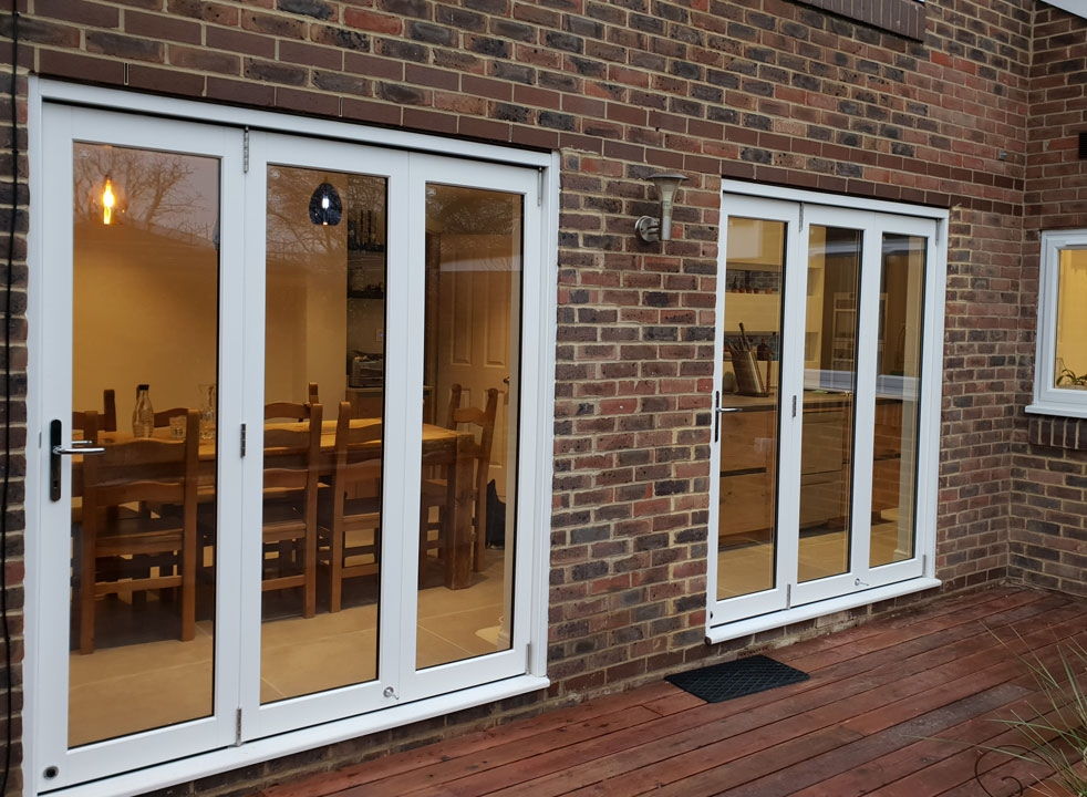 2 sets of Master White timber 1.8M bifold doors