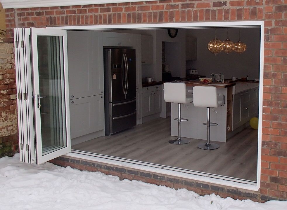 Master White 3.6M Bifold door open into the kitchen