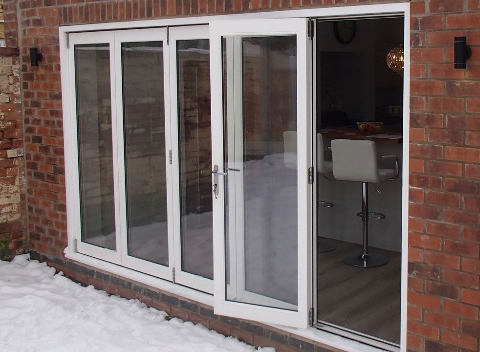 Master White 3.6M Bifold door - access door open looking into the kitchen