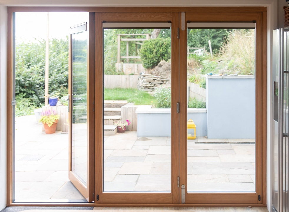 Inside view of a 2.7M Ultra grey bifold door with the access door open