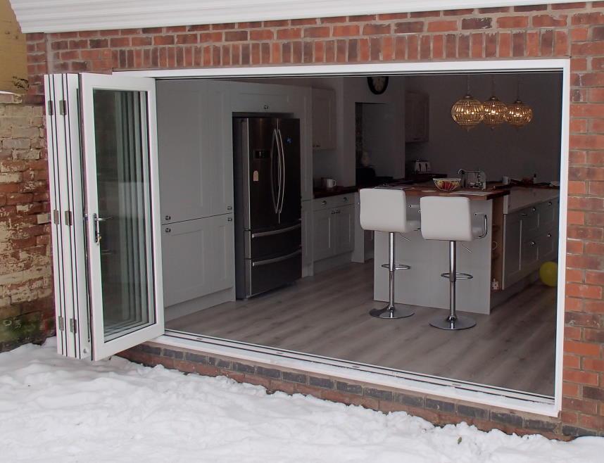 Master White 3.6M Bifold door open into the kitchen