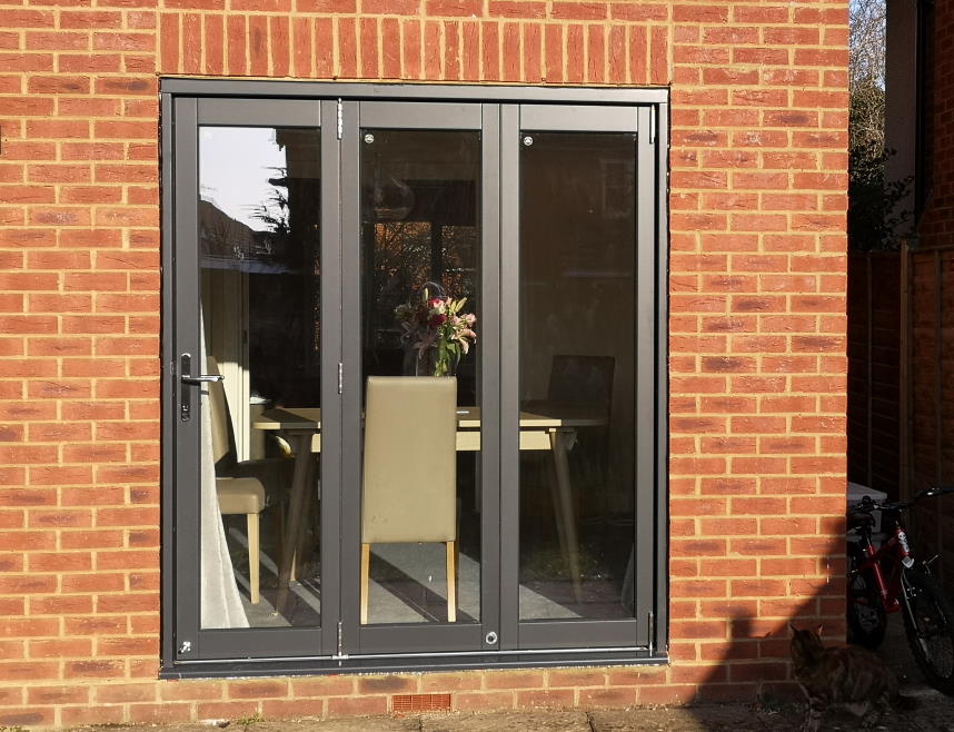 Closed Master grey External Bifold doors