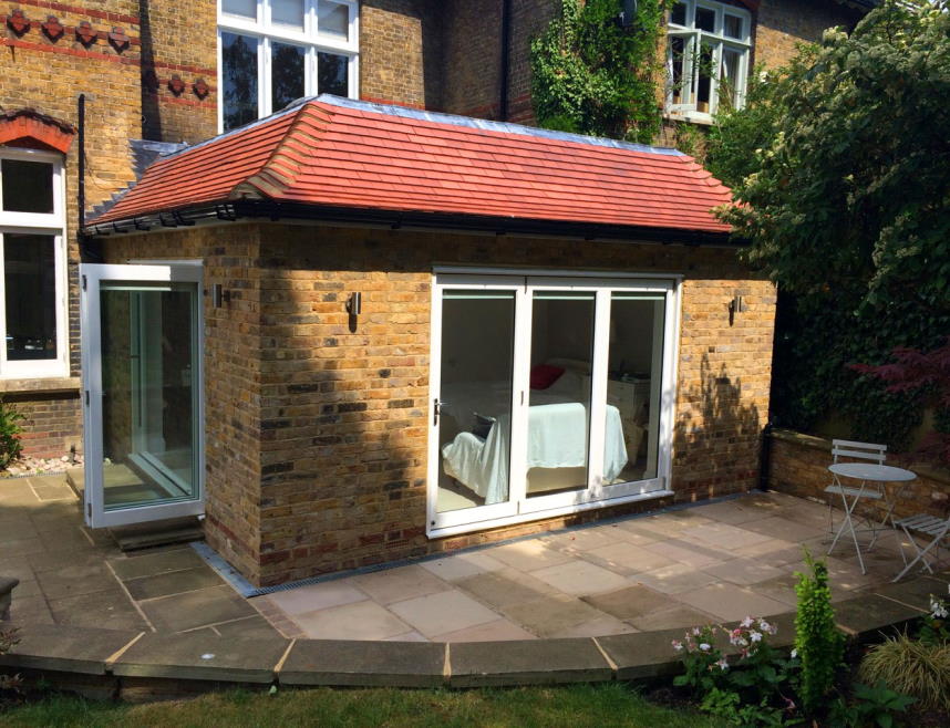 Master 9ft bifold doors enhance the bedroom-cum-lounge