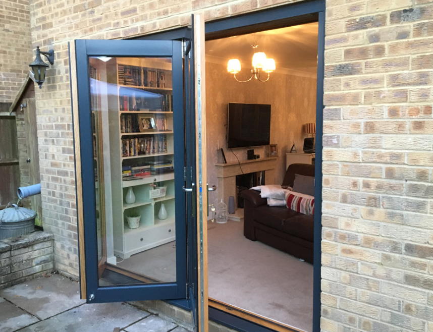 Access doors open on a 2.4M Grey External Bifold Door set
