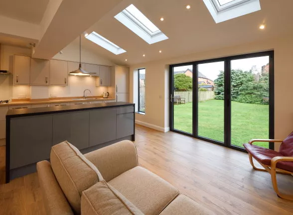 Inside view of Vufold Status aluminium bifold doors installed on a Chester home