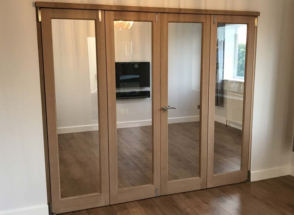 Closed 2.4M Inspire internal bifold doors perfeclty intersect 2 rooms