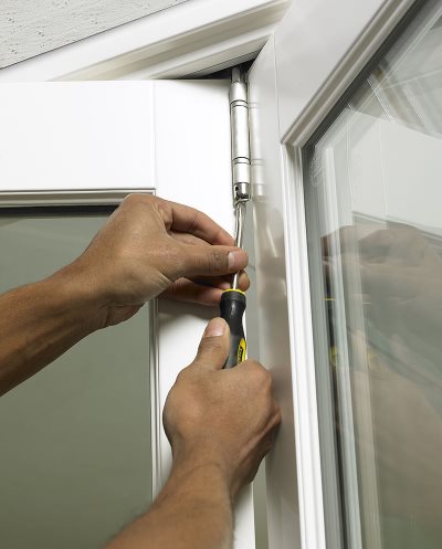 Adjust the door position from the top hinge