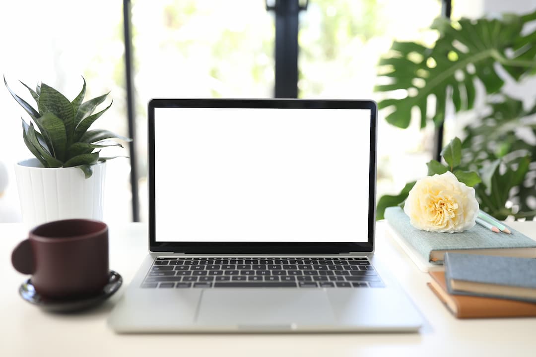 Laptop and coffee cup