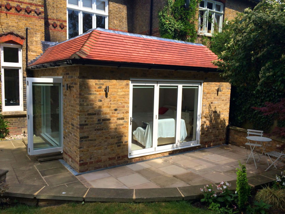 Master 9ft bifold doors enhance the bedroom-cum-lounge