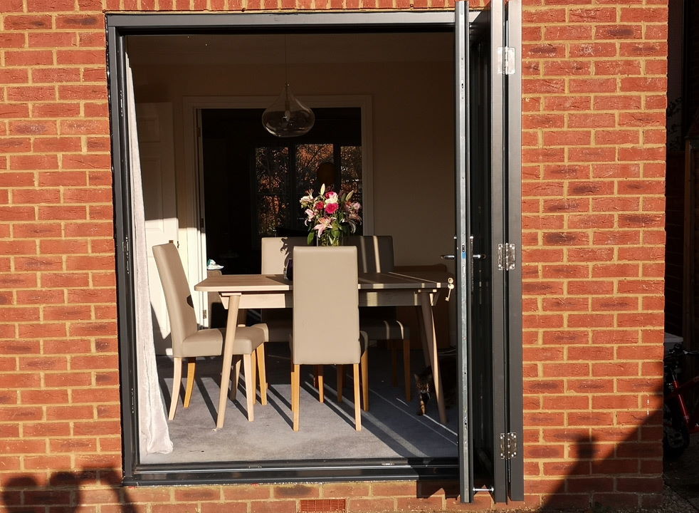 Open Master grey External Bifold doors