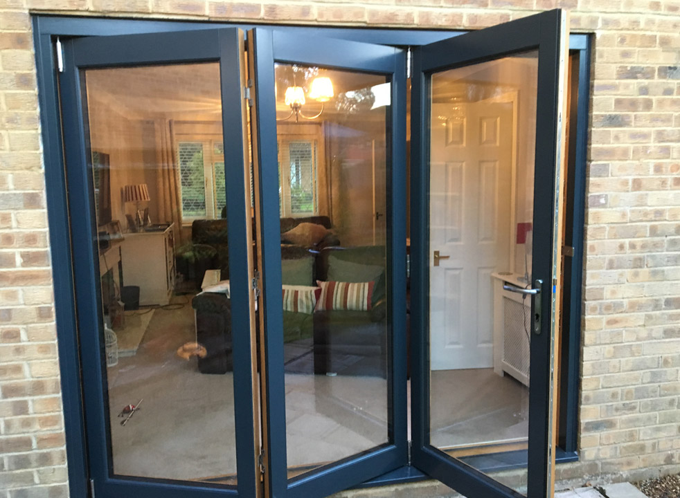 Outside partially open 2.4M Grey External Bifold Door set