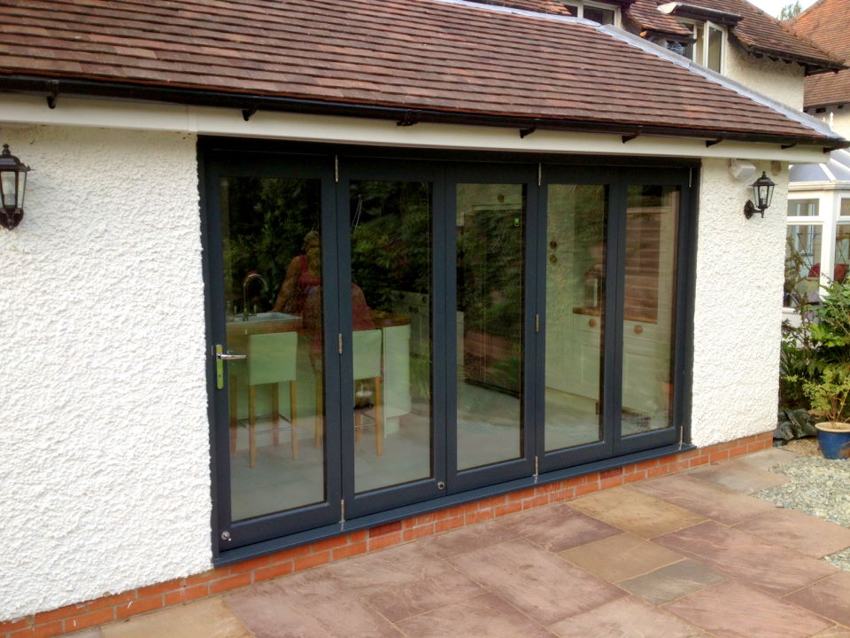 Outside, closed Aluminium clad Ultra 12ft Bifold Doors