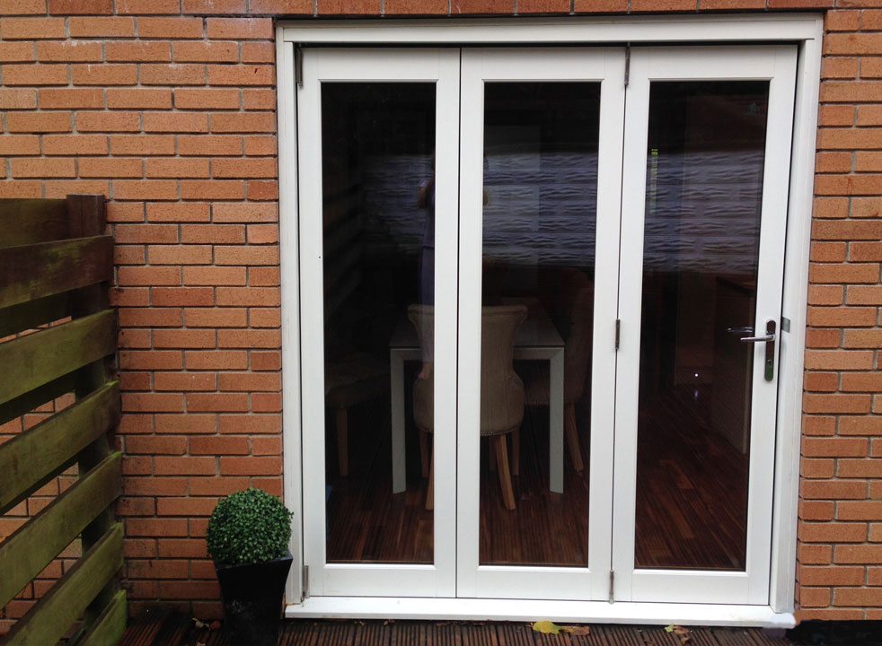 Outside, closed 1.8M Ultra white extrenal bifold doors