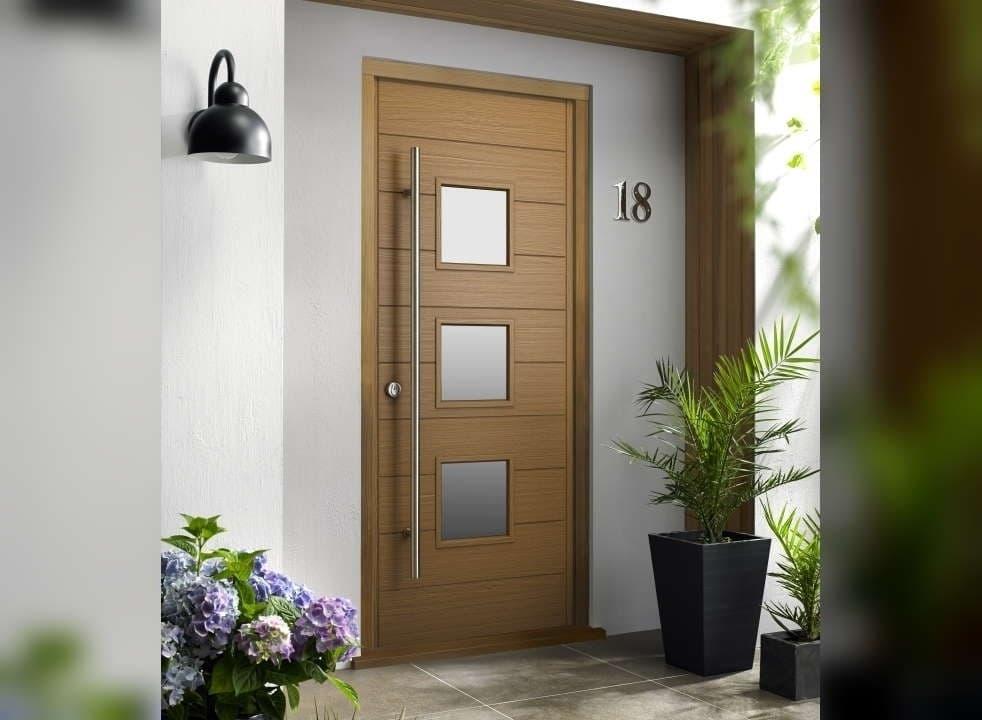 Wooden front door with plants